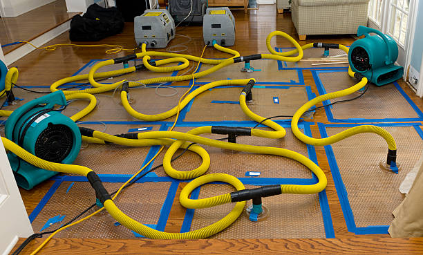 Professional Flood Damage Restoration technician working in Yarmouth, ME